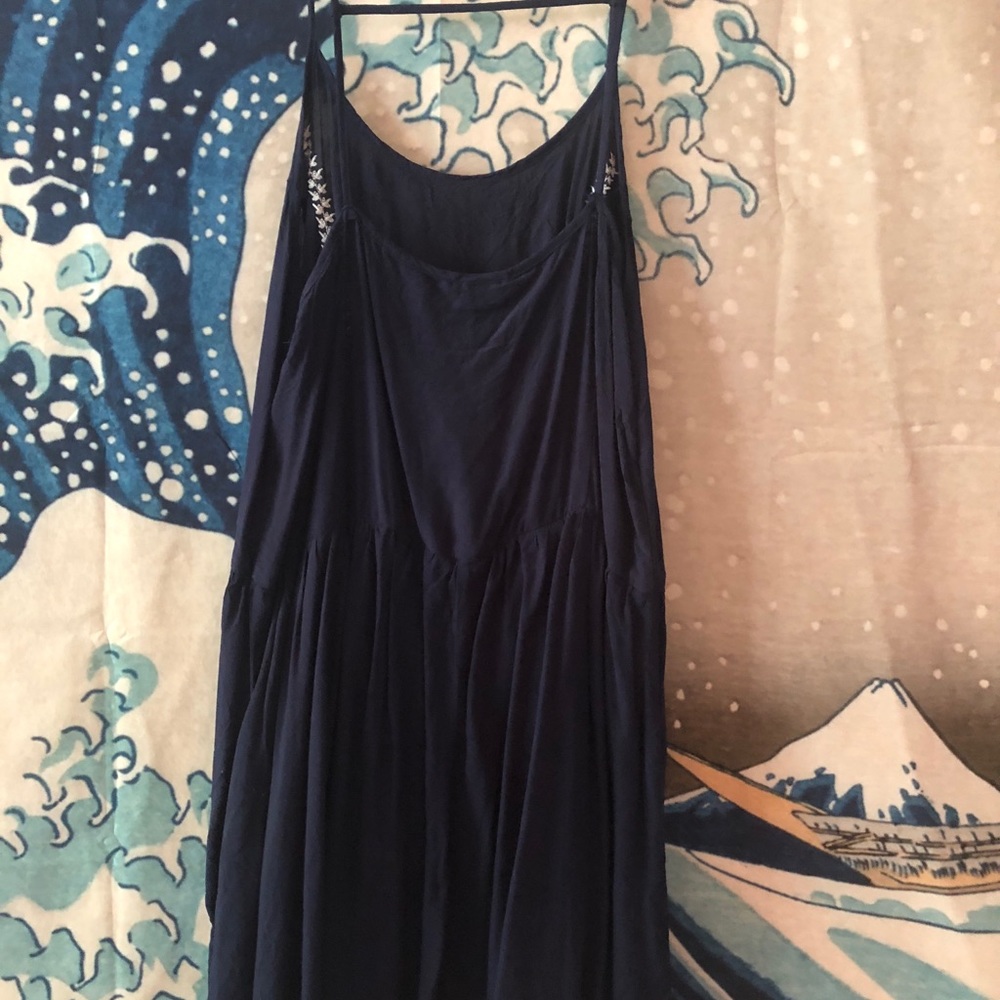 Strappy navy dress with white embroidery